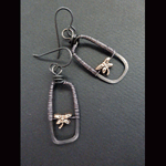 Wire wrapped hammered steel with brass dragonfly earrings